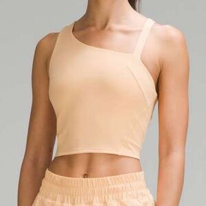Brand New LULULEMON "Everlux Asymmetrical Tennis Tank" - Size 12